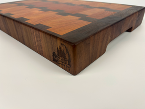 Wooden cutting board with a geometric pattern on a white background