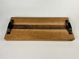 Wooden tray with black handles on a white background