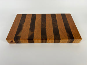 Wooden cutting board with striped pattern on a white background