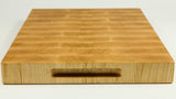 Wooden cutting board with a handle on a white background