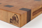 Wooden cutting board with a visible brand logo on a white background