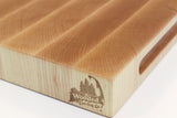 Corner detail of Board Single - MapleMagic showing the Wooded logo