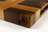 Corner detail of The Crossroads showing the Wooded logo