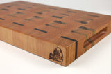 Corner detail of Grain & Dash showing the Wooded logo