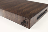 Corner detail of WalnutWorkhorse26 showing the Wooded logo