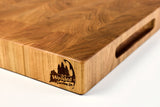 Corner detail of Cherry Squares showing the Wooded logo