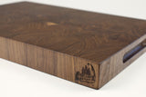 Corner detail of Dark Diamonds showing the Wooded logo