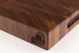 Corner detail of Walnut Wave showing the Wooded logo