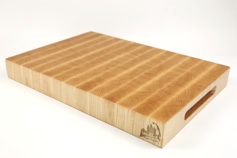 Mid-angle hero shot of Maple Single No. 12 — Maple end-grain cutting board, 12.5″ × 18.5″ × 2″