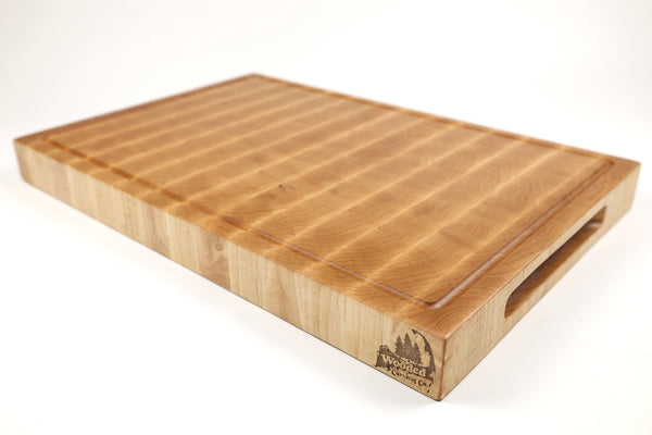 Mid-angle hero shot of Maple Single No. 4 — Maple end-grain cutting board, 12.5″ × 19.5″ × 1.75″