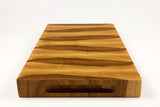 Handle-end view of BoardHickory28, Hickory end-grain cutting board
