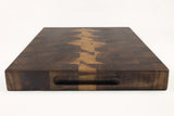 Handle-end view of Thorns in a Thicket, Walnut end-grain cutting board