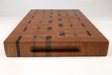 Handle-end view of Grain & Dash, Cherry and Walnut end-grain cutting board