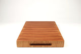 Handle-end view of BoardCherry35, Cherry end-grain cutting board