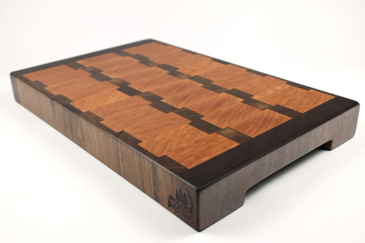 Mid-angle hero shot of Rocky Road No. 8 — Cherry and Walnut end-grain cutting board, 12.5″ × 19.5″ × 2″