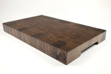 Mid-angle hero shot of Key Walnut — Walnut end-grain cutting board, 13″ × 21.5″ × 2.25″