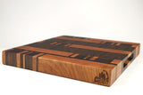 Mid-angle hero shot of 26049 — Maple and Walnut end-grain cutting board, 15″ × 16.5″ × 1.75″
