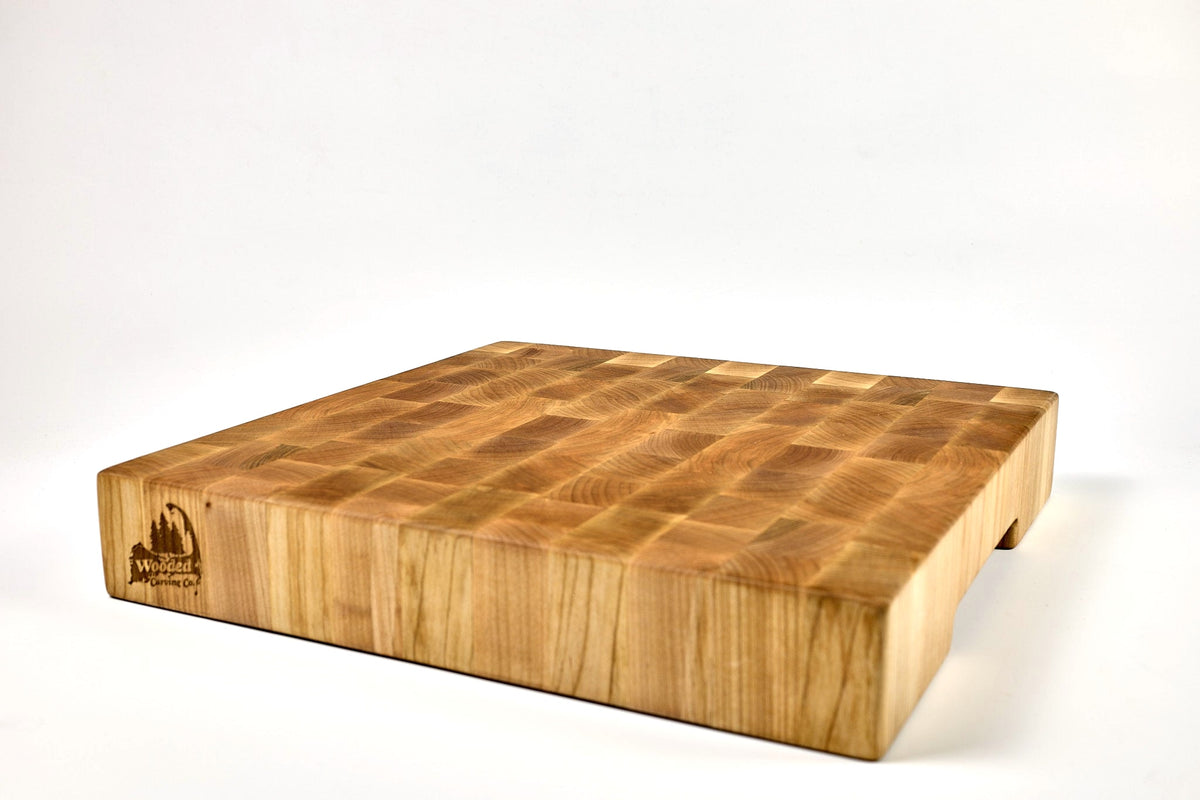 Mid-angle hero shot of Marbled Maple — Maple end-grain cutting board, 15″ × 15″ × 2.5″