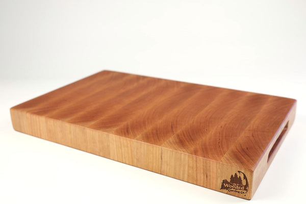 Mid-angle hero shot of SingleCherry39 — Cherry end-grain cutting board, 12″ × 19″ × 1.75″