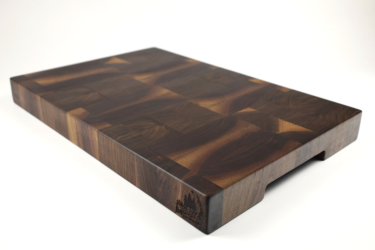 Mid-angle hero shot of Fitz & Deco — Walnut end-grain cutting board, 14.5″ × 21.5″ × 2″