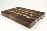 Mid-angle hero shot of Retro Metro — Walnut and Maple end-grain cutting board, 12.5″ × 18.5″ × 2″
