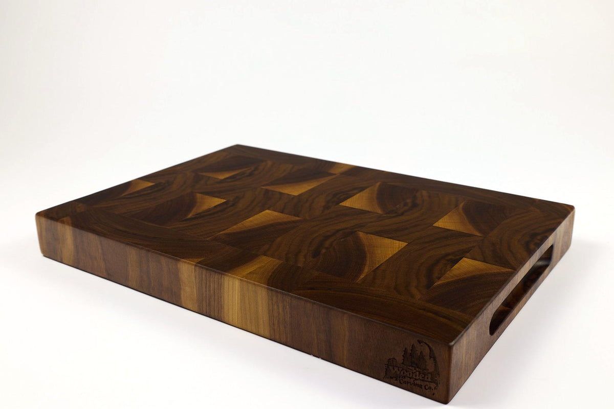 Mid-angle hero shot of Patterned Planks — Walnut end-grain cutting board, 11.75″ × 16″ × 1.75″