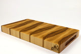 Mid-angle hero shot of BoardHickory28 — Hickory end-grain cutting board, 10.5″ × 18″ × 1.75″