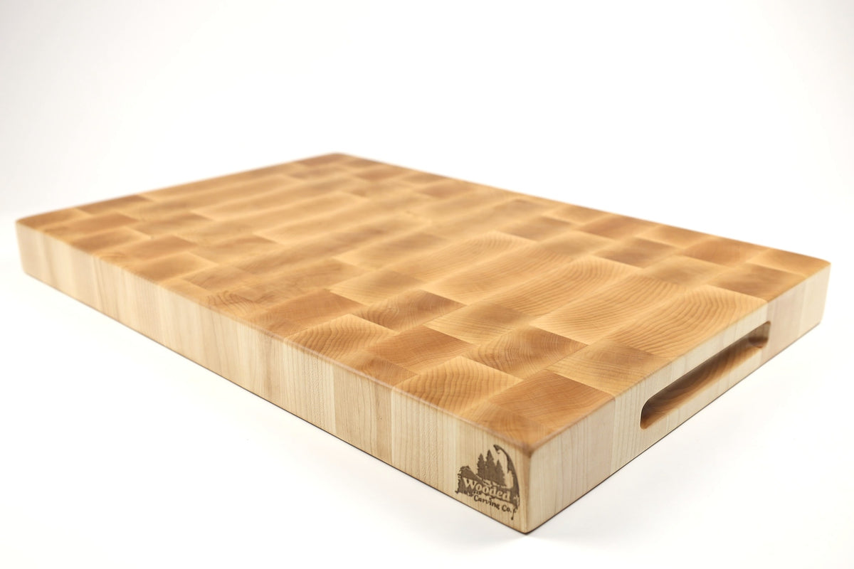 Mid-angle hero shot of The Maple Standard No. 2 — Maple end-grain cutting board, 14.5″ × 22″ × 2″