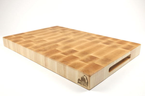 Mid-angle hero shot of The Maple Standard No. 2 — Maple end-grain cutting board, 14.5″ × 22″ × 2″