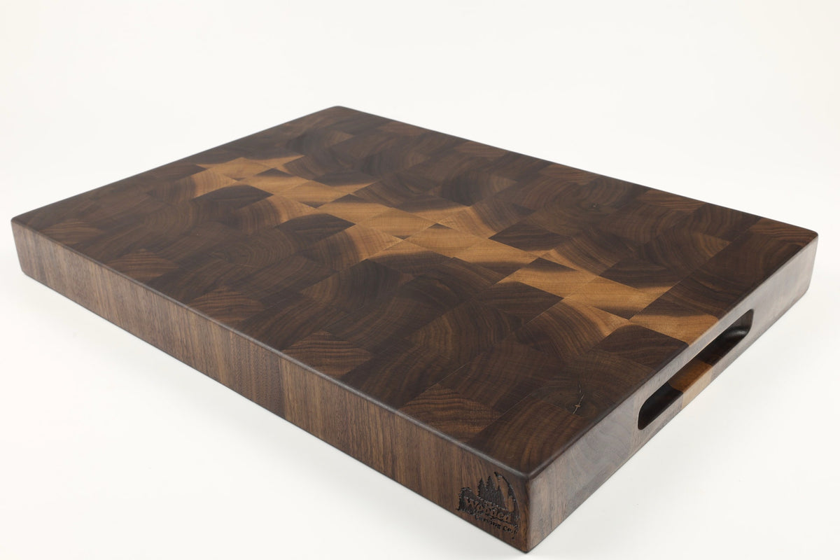 Mid-angle hero shot of Thorns in a Thicket — Walnut end-grain cutting board, 13.5″ × 19″ × 2″