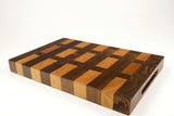 Mid-angle hero shot of Cherry Walnut Lattice — Walnut and Cherry end-grain cutting board, 12″ × 18″ × 1.75″