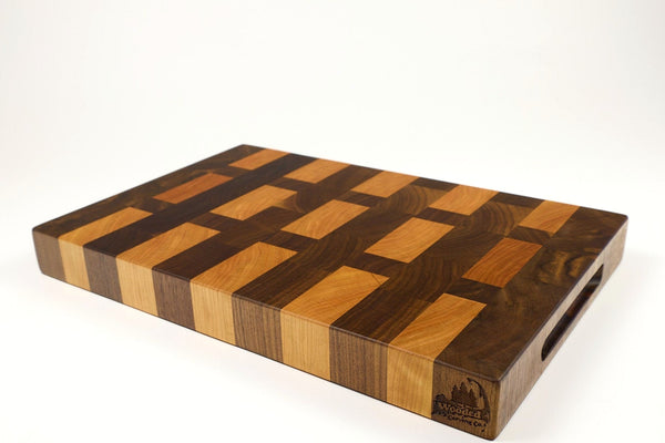 Mid-angle hero shot of Cherry Walnut Lattice — Walnut and Cherry end-grain cutting board, 12″ × 18″ × 1.75″