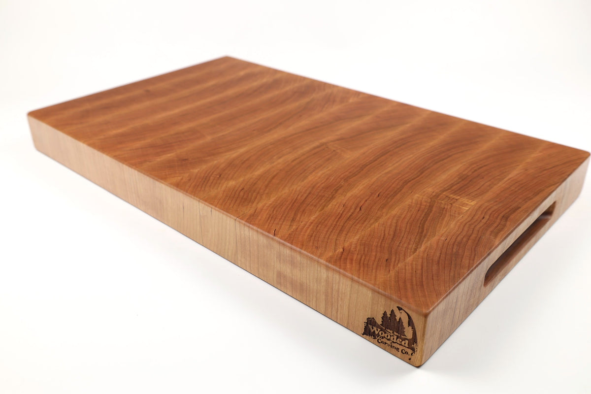 Mid-angle hero shot of Cherry Single No. 10 — Cherry end-grain cutting board, 13.5″ × 22.5″ × 2″
