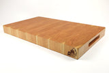 Mid-angle hero shot of Cherry Single No. 9 — Cherry end-grain cutting board, 13.5″ × 22.5″ × 2″