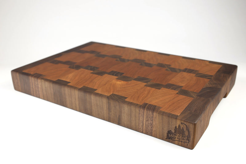 Mid-angle hero shot of A Rocky Road — Cherry and Walnut end-grain cutting board, 14″ × 20″ × 2.5″