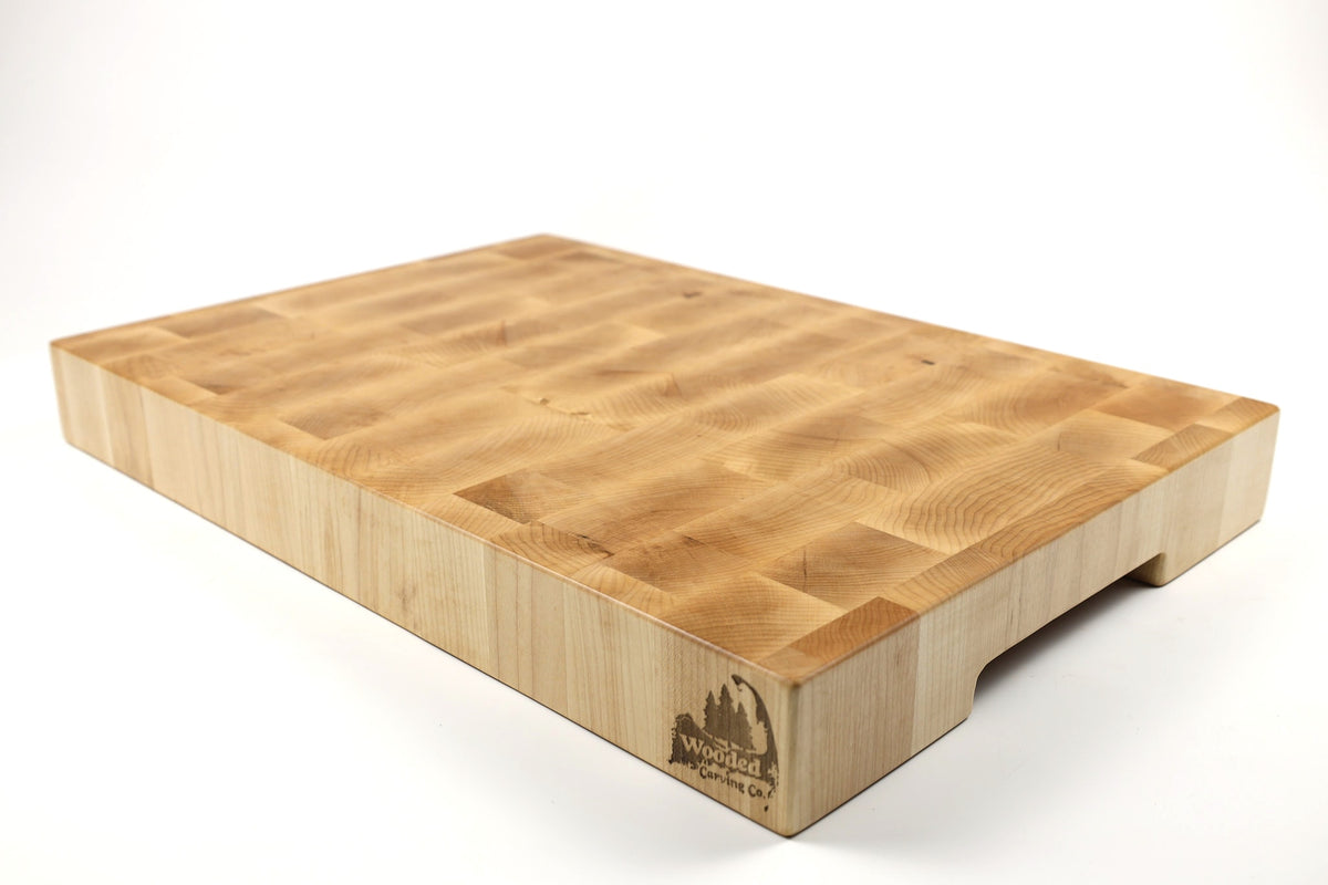 Mid-angle hero shot of Wishbone — Maple end-grain cutting board, 14.5″ × 21.5″ × 2.5″