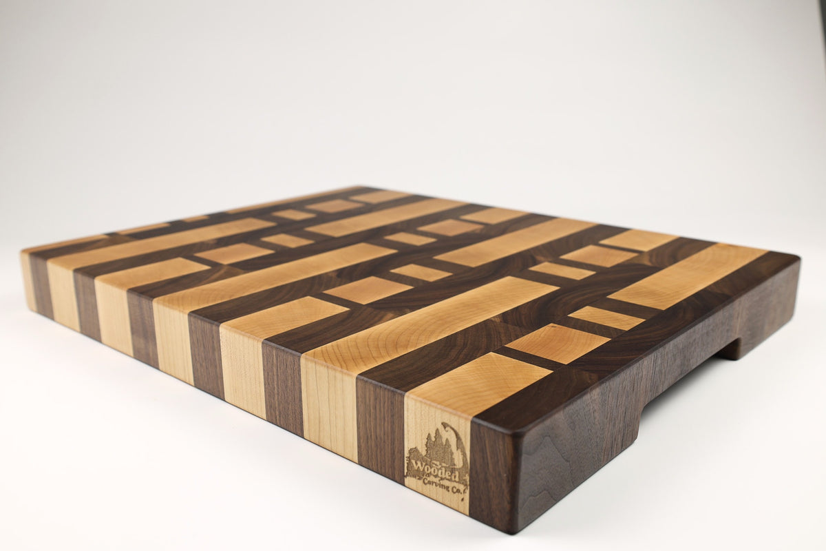 Mid-angle hero shot of 26050 — Cherry and Maple end-grain cutting board, 15.5″ × 19.5″ × 2″