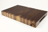 Mid-angle hero shot of Walnut Single No. 9 — Walnut end-grain cutting board, 11.5″ × 17″ × 2″