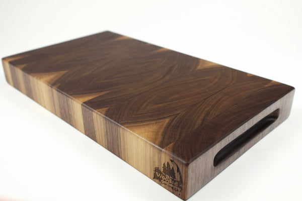Mid-angle hero shot of Walnut Single No. 10 — Walnut end-grain cutting board, 9.5″ × 17.5″ × 2″