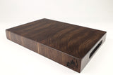 Mid-angle hero shot of WalnutWorkhorse26 — Walnut end-grain cutting board, 11″ × 16″ × 2″