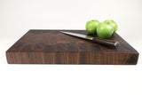 Side mid-angle of Squares & Swirls with knife and fruit for scale