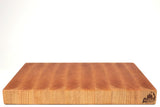 Side mid-angle of SingleCherry39 with knife and fruit for scale