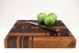 Side mid-angle of 26049 with knife and fruit for scale