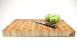 Side mid-angle of The Maple Standard No. 2 with knife and fruit for scale