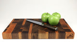 Side mid-angle of 26051 with knife and fruit for scale