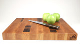 Side mid-angle of Five Cylinders with knife and fruit for scale