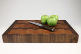 Side mid-angle of A Rocky Road with knife and fruit for scale