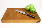 Side mid-angle of Cherry Squares with knife and fruit for scale