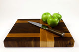 Side mid-angle of The Crossroads with knife and fruit for scale