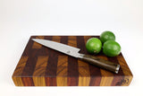 Side mid-angle of Red Canary with knife and fruit for scale